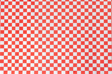 A View Of An Entree Paper Liner Featuring A Red And White Checker Pattern.