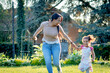 © jorge - Happy young mother hispanic with her daughter at park