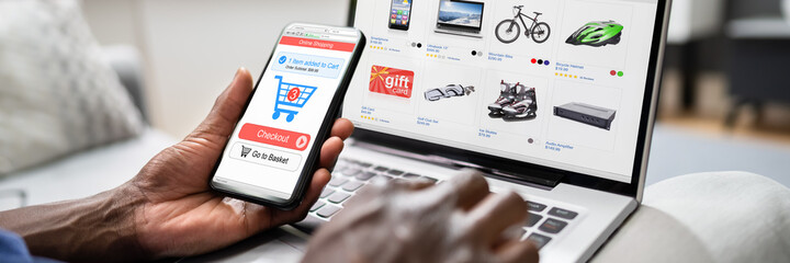 Poster - African American Using Online Ecommerce Store On Laptop