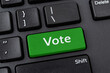 © Maryia - Vote green key on a black pc keyboard. Online participation in elections, internet voting and e-voting concepts. Computer notebook enter key with Vote word. Message on the enter button of keyboard.