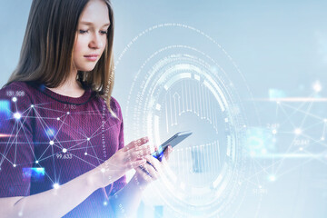 Poster - Businesswoman wearing purple sweater is holding smartphone with the hologram