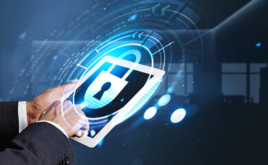 Poster - Businessman wearing formal suit is holding tablet with hologram