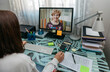 © David Pereiras - Unrecognizable woman talking on video call with computer with her mother