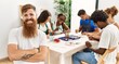 © Krakenimages.com - Group of people drawing sitting on the table. Caucasian man smiling happy looking to the camera at art studio.