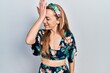 © Krakenimages.com - Young caucasian woman wearing casual clothes surprised with hand on head for mistake, remember error. forgot, bad memory concept.
