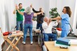 © Krakenimages.com - Group of retired people having party dancing with doctor and volunteer at nurse home.