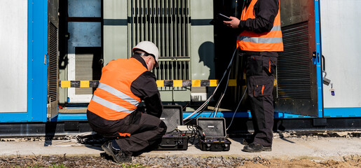 Wall Mural - execution of electrical measuring works on the power transformer