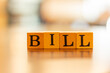 The word Bill and blur background,The word on wood square cubes,Concept word cubes, Wooden box