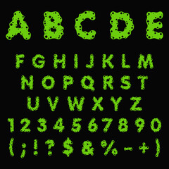 Aufkleber - Alphabet, letters, numbers and signs made of green slime, liquid. Isolated colored vector objects on a black background.