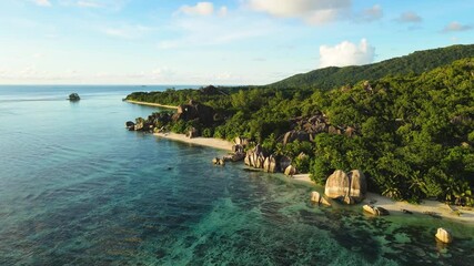 Wall Mural - Anse Source d'Argent beach in La Digue island, Seychelles. Paradise holiday vacation destination, scenic landscape with turquoise sea water and white sand. Aerial drone video footage 4k 60fps