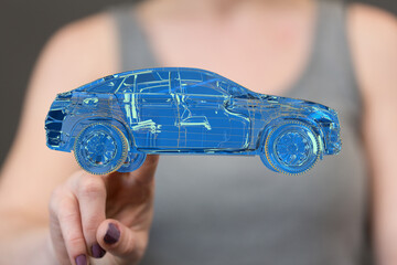 Aufkleber - Man holding and touching holographic smart car