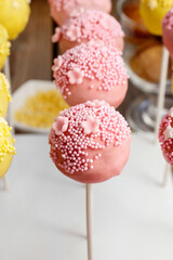 Canvas Print - Yellow and pink cake pops.