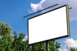 © Andrii - blank advertising billboard mockup. urban life. near park area. template for design. large advertising road banner