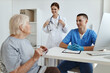 © SHOTPRIME STUDIO - elderly woman patient at doctor's appointment and nurse treatment