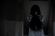 © sorapop - Horror woman ghost creepy standing show 2 hands at the house, halloween day concept