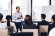 © Art_Photo - Businessman coach speaker presentation and discussing meeting strategy sharing idea.Creative team casual business people seminar and brainstorm in conference seminar at hall.presentation and teamwork