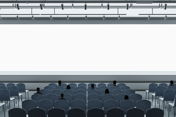 Poster - People in contemporary grey auditorium with seating and empty screen with mock up place for your advertisement. Show premiere and entertainment concept.