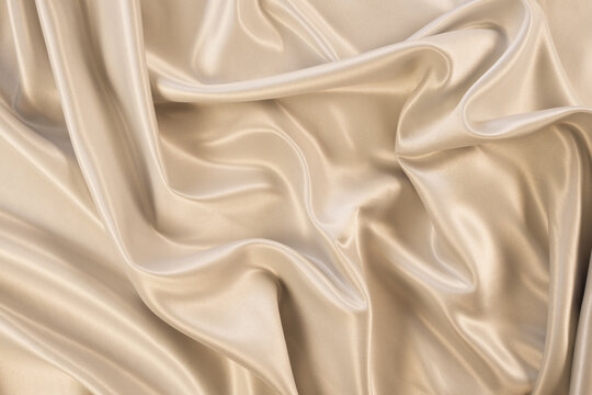 Wall Mural - Photography of beautiful elegant wavy beige or light brown satin silk luxury cloth fabric texture, abstract background design. Copy space. Card or banner