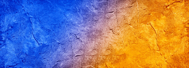 Wall Mural - blue orange yellow abstract background. toned rock texture background with copy space for design. wi