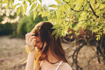 Wall Mural - Woman outdoors tree field summer vacation fun