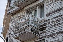 Closeup Shot Of An Aged Wooden Building Balcony