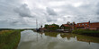 Snape Maltings  and  the river Alde  Suffolk on a cloudy day.