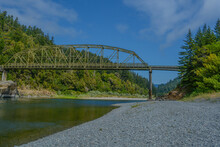 The Bridge Over The Rogue River In The Wilderness Of Oregon