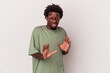 Young african american man isolated on white background  rejecting someone showing a gesture of disgust.