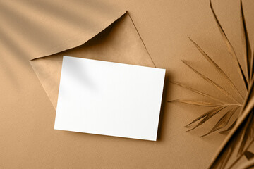 Invitation card mockup with palm tree leaf decoration