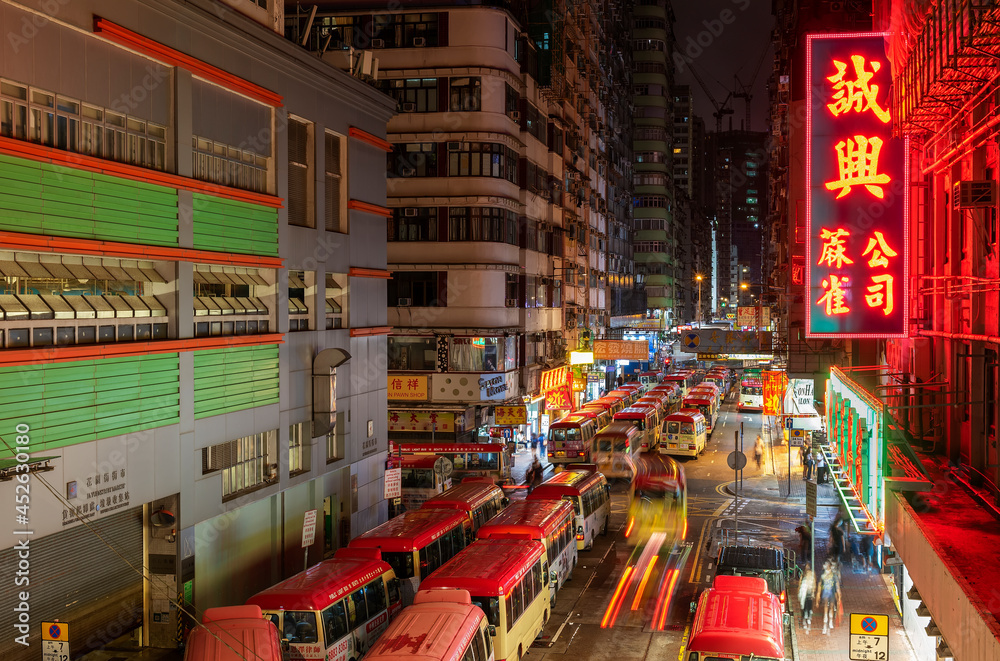 Hong Kong, China - June 26, 2021 : Night scenery of Mongkok District in Hong Kong, China. Mongkok in Kowloon Peninsula is the most busy and overcrowded district in Hong Kong