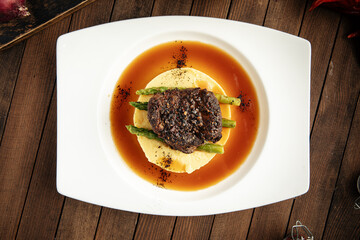 Wall Mural - Grilled beef pepper steak with mashed potatoes and asparagus