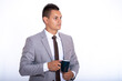 © blanke1973 - a young handsome businessman in a suit with a cup of coffee