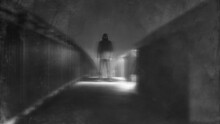 A Scary Figure With Glowing Eyes Standing On A Bridge At Night. With A Blurred, Grunge, Textured Edit.