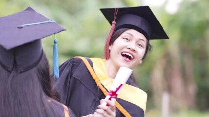 Wall Mural - Congratulation graduate are celebrating ceremony graduation Throwing hands up a certificate and Cap celebrate the graduation day.      