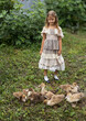 © Evgenia Tiplyashina - Girl with ducklings