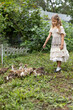© Evgenia Tiplyashina - Girl with ducklings