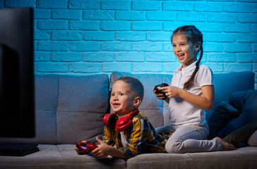 Wall Mural - children playing video game with game console