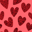 Valentine's Day seamless pattern. Hand-drawn hearts with tattoos with various symbols, phrases, messages.