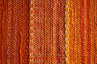 © gabriel - orange, red and yellow tapestry fabric texture background wallpaper