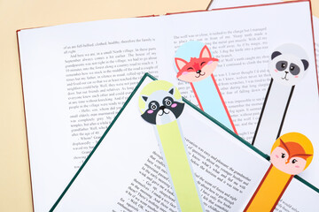 Poster - Cute bookmarks with books on color background