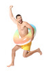© Pixel-Shot - Young man with inflatable ring jumping on white background