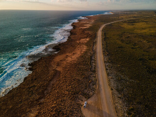 Wall Mural - Golden hour sunset over Quobba blowholes, Western Australia 