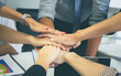 © JU.STOCKER - Business team celebrating victory in office, Business people putting their hands together, Success teamwork concepts