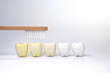 Toothbrush on foreground with Discoloration teeth from yellow to whitening teeth
