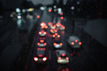 Wall Mural - traffic in the city during rainfall, autumn weather