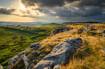 Poster - Crags and Golden Grass on Bowden Doors. Raven's Crag and Bowden Doors are two crag rock formations in Northumberland in North East England, near Belford, designated as a SSSI, popular with climbers