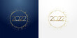 2022 glittering golden circle Happy New Year banner. Gold digits in sparkling ring with dust glitter graphic on dark blue and white background. Beautiful numbers graphic design template