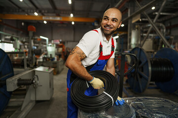 Wall Mural - Portrait of a smiling handsome african american factory worker