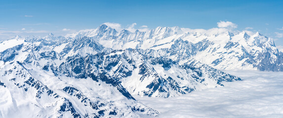  Switzerland, Panoramic view on Snow Alps and Blue Sky around Titlis mountain