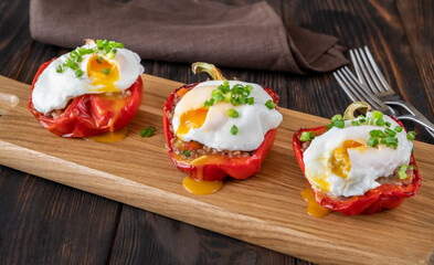 Canvas Print - Stuffed peppers with meat with poached eggs